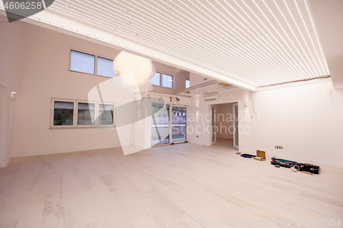 Image of Interior of empty stylish modern open space two level apartment