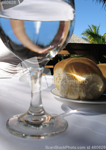 Image of water glass and bread