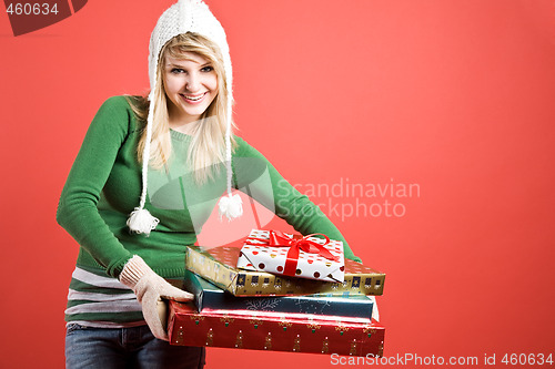 Image of Caucasian girl with gifts on holiday