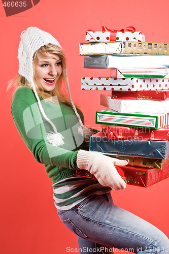 Image of Caucasian girl with gifts on holiday