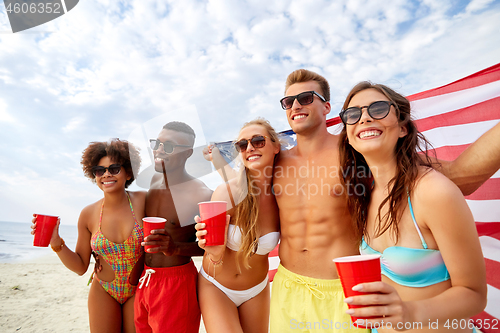 Image of friends at american independence day beach party