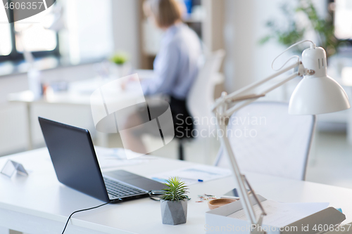 Image of laptop computer on office table