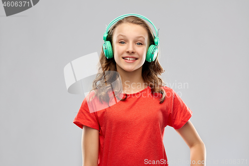 Image of happy teenage girl with headphones