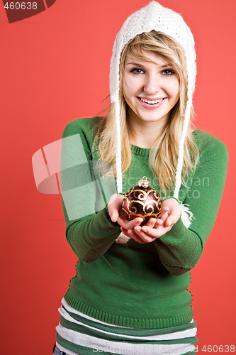 Image of Caucasian girl with christmas ornament