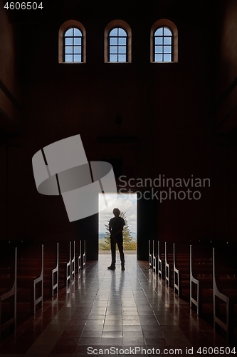 Image of Standing in the church door