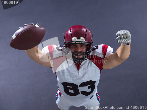 Image of american football player celebrating touchdown