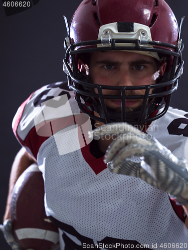 Image of American football Player running with the ball