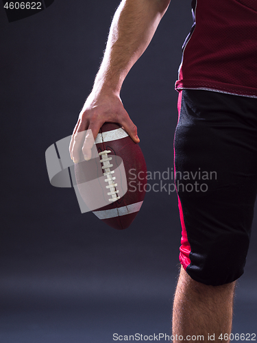 Image of closeup American Football Player isolated on gray