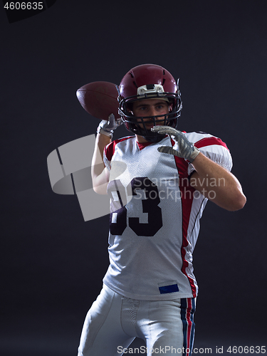 Image of american football player throwing ball