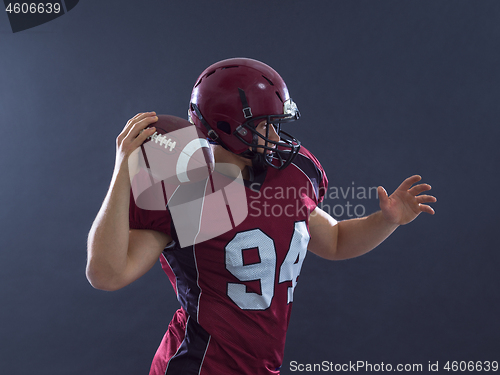 Image of american football player throwing ball