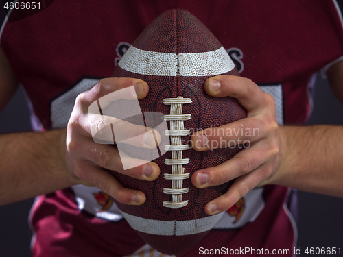 Image of closeup American Football Player isolated on gray