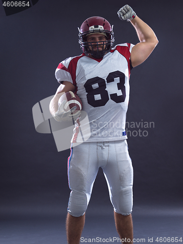 Image of american football player celebrating touchdown