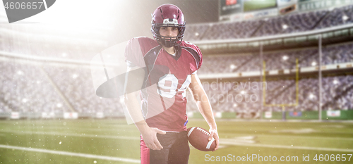 Image of American Football Player isolated on big modern stadium field