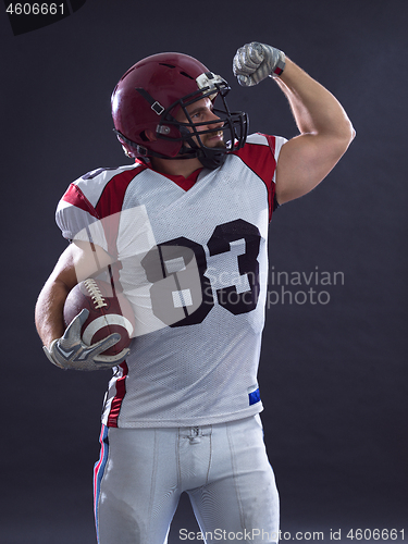 Image of american football player celebrating touchdown