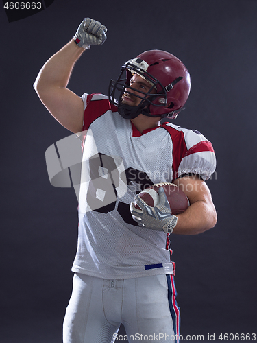 Image of american football player celebrating touchdown