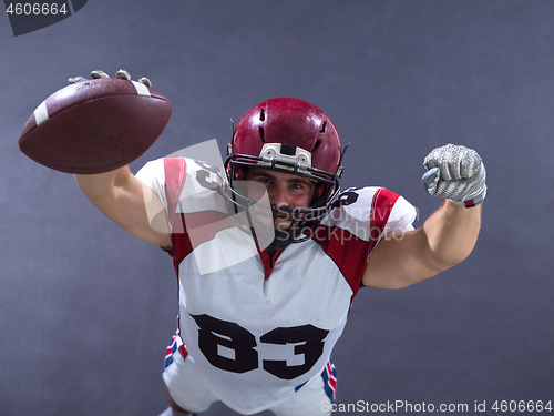 Image of american football player celebrating touchdown