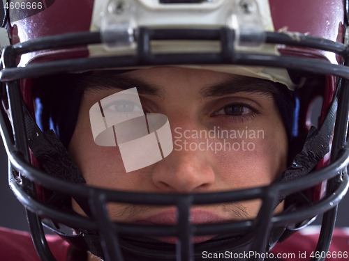 Image of closeup American Football Player isolated on gray