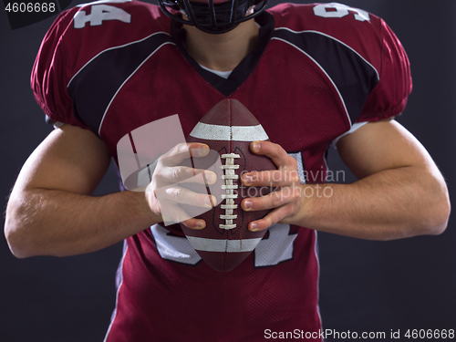 Image of closeup American Football Player isolated on gray