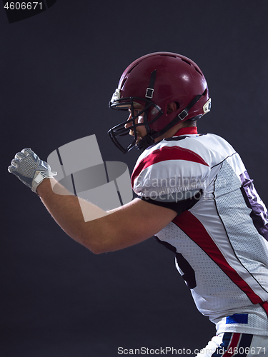 Image of American football Player running with the ball