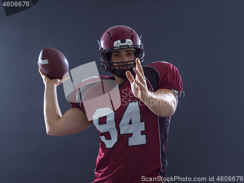 Image of american football player throwing ball