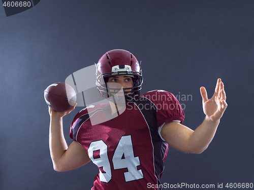 Image of american football player throwing ball