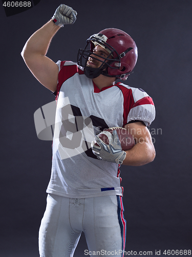 Image of american football player celebrating touchdown