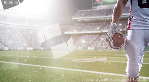 Image of closeup American Football Player isolated on big modern stadium