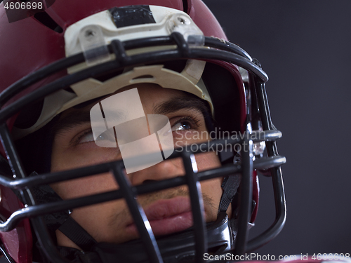 Image of closeup American Football Player isolated on gray