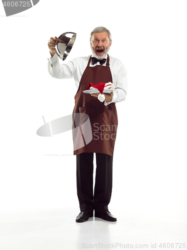 Image of Senior waiter at studio