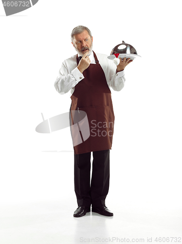 Image of Senior waiter at studio