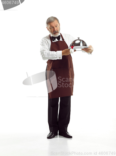 Image of Senior waiter at studio