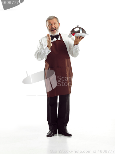 Image of Senior waiter at studio