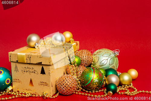 Image of Christmas decoration gift box with red background