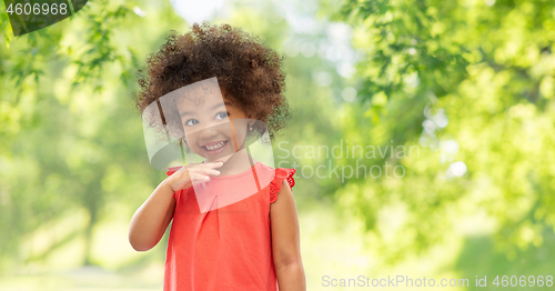Image of happy little african american girl in summer