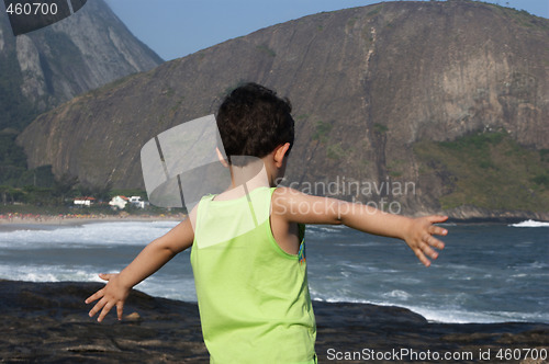 Image of Kid contemplating nature in Itacoatiara beach 