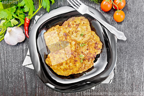 Image of Fritters meat in plate on board top