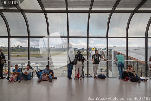 Image of Passangers waiting in the airport terminal building