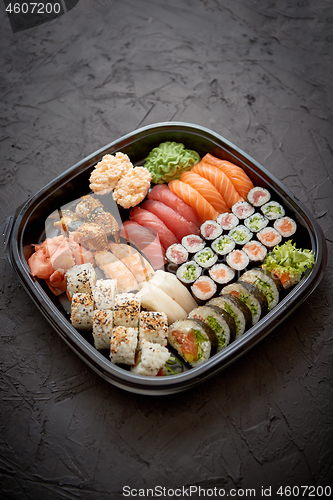 Image of Various kinds of sushi on plate or platter set