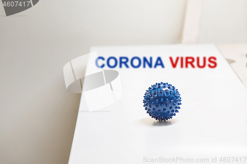 Image of Shot of microscope virus close up. Coronavirus concept Tablet in the fingers of hand