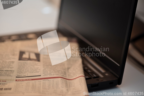 Image of Black notebook and finance newspaper. Coronavirus concept. Work from home concept