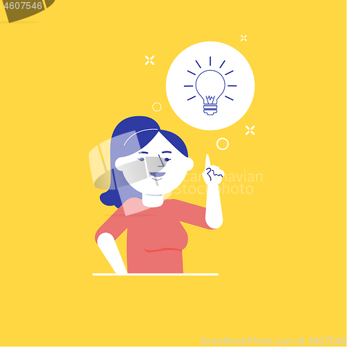 Image of Young business woman pointing at idea lightbulb.