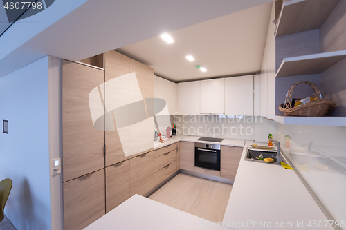 Image of modern bright clean kitchen interior