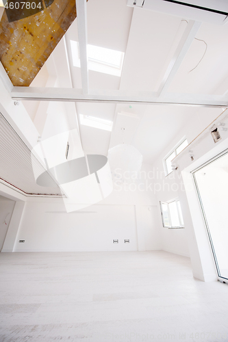 Image of Interior of empty stylish modern open space two level apartment