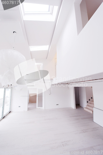 Image of Interior of empty stylish modern open space two level apartment