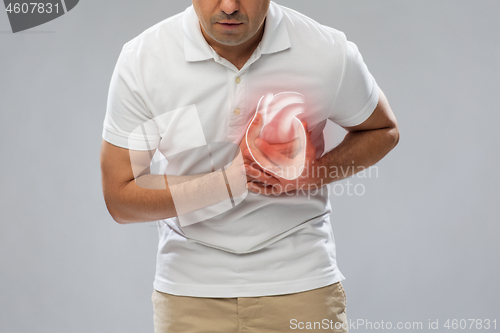 Image of close up of man having heart attack or heartache