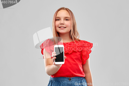 Image of beautiful smiling girl showing smartphone