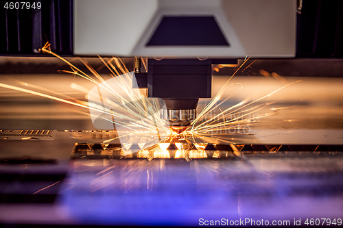 Image of CNC Laser cutting of metal, modern industrial technology.