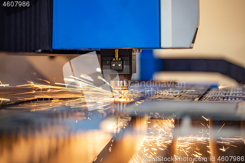 Image of CNC Laser cutting of metal, modern industrial technology.