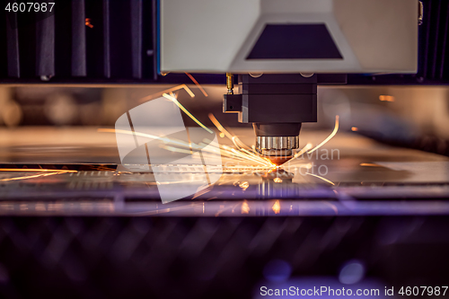 Image of CNC Laser cutting of metal, modern industrial technology.