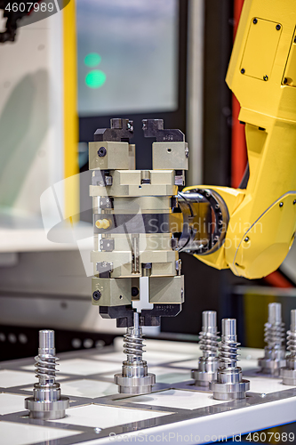 Image of Robotic Arm modern industrial technology. Automated production c